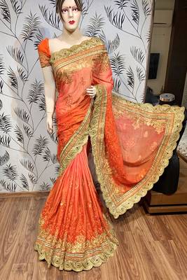 Pure chiffon wedding wear saree in orange with embroidery work & crystal stone work 2