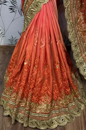 Pure chiffon wedding wear saree in orange with embroidery work & crystal stone work