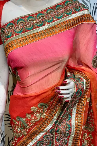 Heritage silk wedding wear saree in orange color with embroidery work & crystal stone work