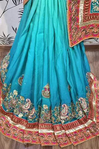 Heritage silk wedding wear saree in green color with embroidery work & crystal stone work