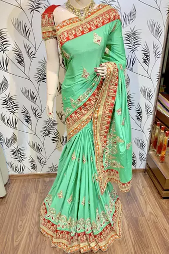 Chinon chiffon wedding wear saree in green with embroidery work & crystal stone work