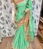 Chinon chiffon wedding wear saree in green with embroidery work & crystal stone work