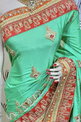 Chinon chiffon wedding wear saree in green with embroidery work & crystal stone work