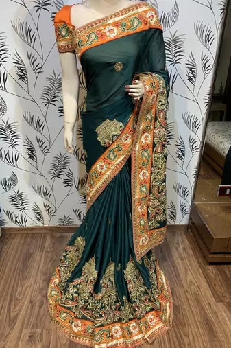 Mulberry silk wedding wear saree in green with embroidery work & crystal stone work