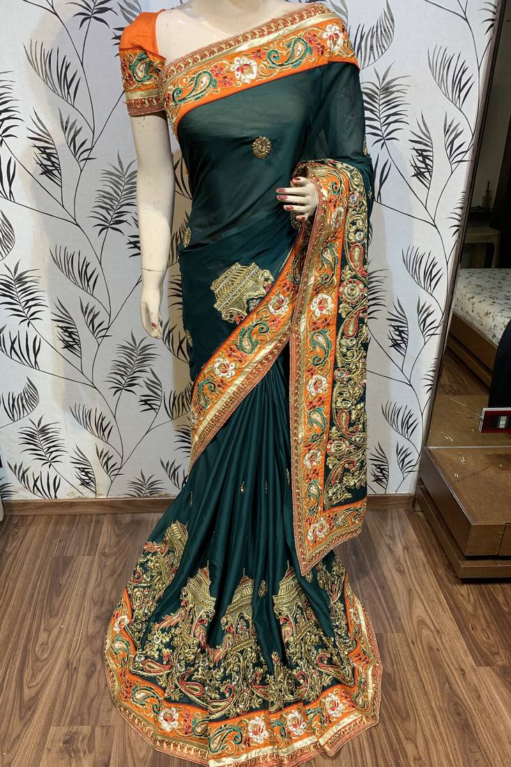 Mulberry silk wedding wear saree in green with embroidery work & crystal stone work