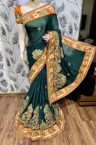 Mulberry silk wedding wear saree in green with embroidery work & crystal stone work