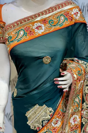 Mulberry silk wedding wear saree in green with embroidery work & crystal stone work