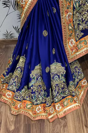 Mulberry silk wedding wear saree in blue with embroidery work & crystal stone work