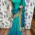 Shadow silk party wear saree in green with embroidery work & crystal stone work