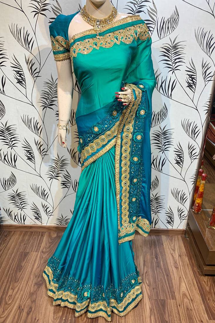 Shadow silk party wear saree in green with embroidery work & crystal stone work