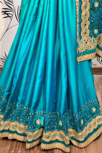 Shadow silk party wear saree in green with embroidery work & crystal stone work