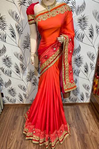 Shadow silk party wear saree in orange with embroidery work & crystal stone work