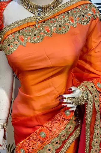 Shadow silk party wear saree in orange with embroidery work & crystal stone work