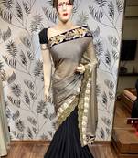 Fancy imported fabrics party wear saree in black with embroidery & crystal stone work