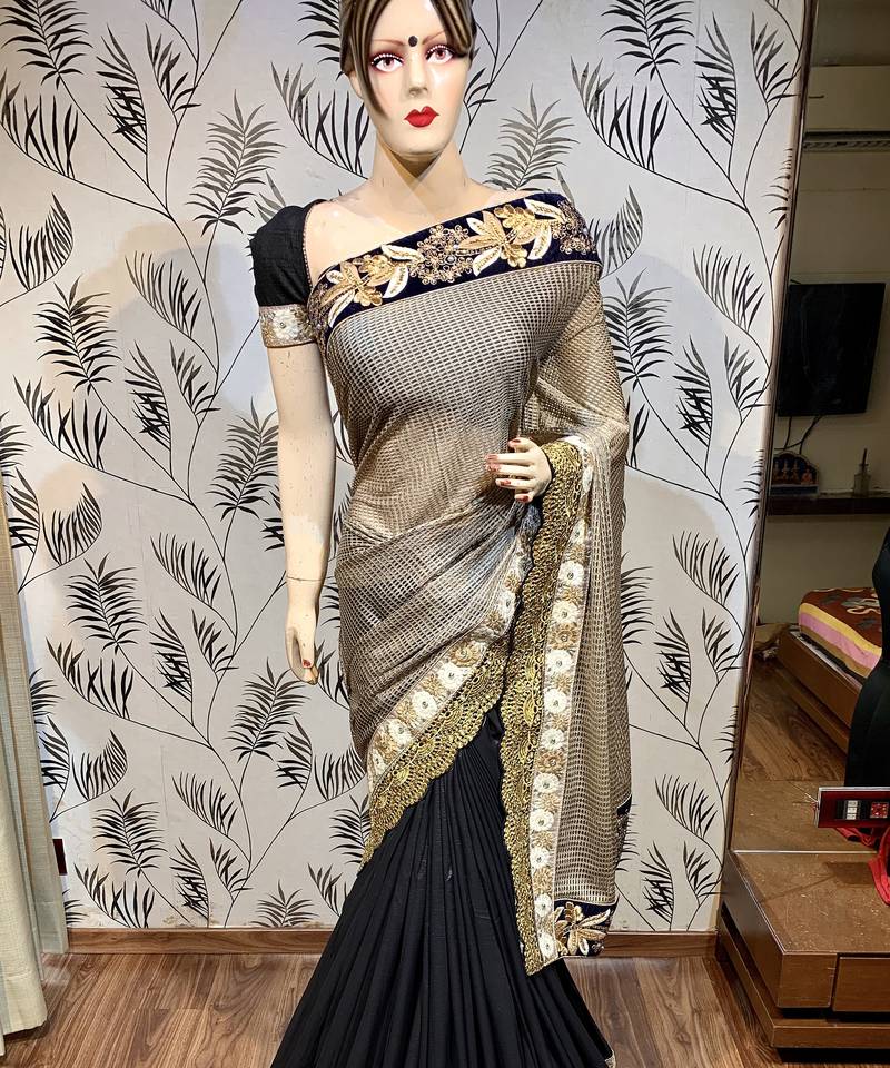 Fancy imported fabrics party wear saree in black with embroidery & crystal stone work