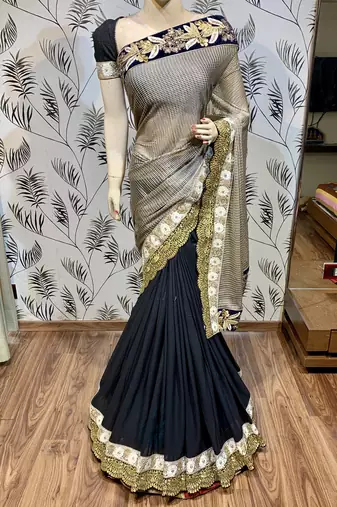 Fancy imported fabrics party wear saree in black with embroidery & crystal stone work