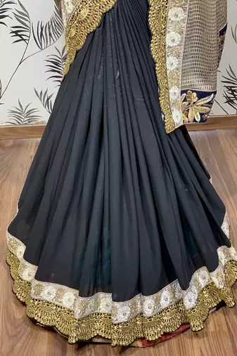 Fancy imported fabrics party wear saree in black with embroidery & crystal stone work