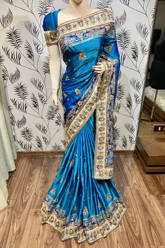 Pure silk wedding wear saree in blue with embroidery work & handwork
