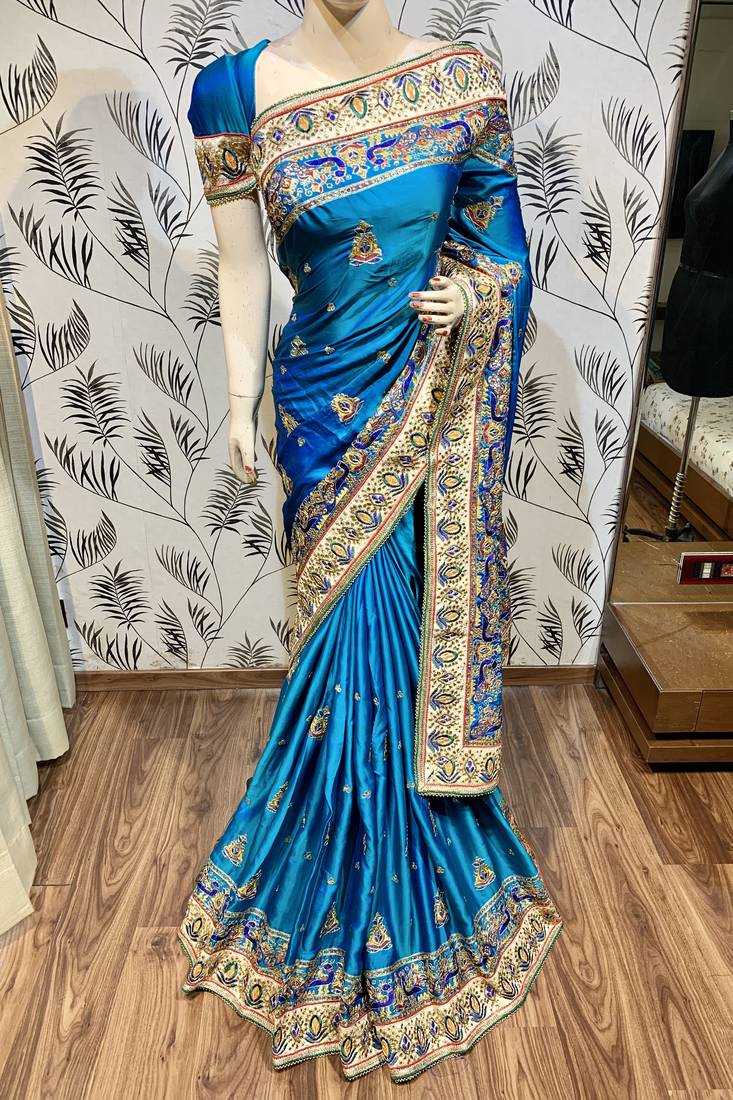 Pure silk wedding wear saree in blue with embroidery work & handwork