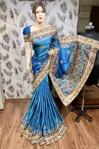 Pure silk wedding wear saree in blue with embroidery work & handwork