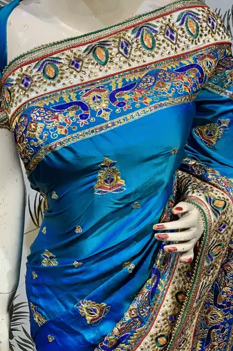 Pure silk wedding wear saree in blue with embroidery work & handwork