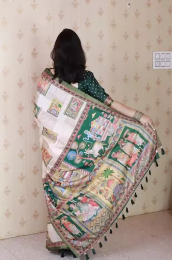 Green tussar silk digital print zari woven border saree with contrast blouse piece