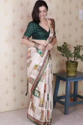Green tussar silk digital print zari woven border saree with contrast blouse piece