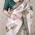 Green tussar silk digital print zari woven border saree with contrast blouse piece