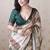 Green tussar silk digital print zari woven border saree with contrast blouse piece
