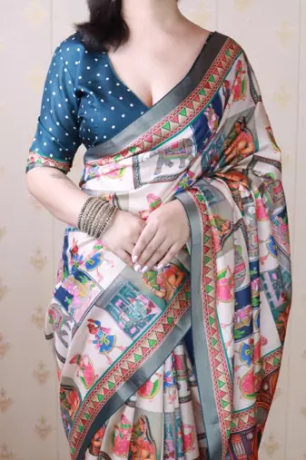 Teal tussar silk digital print zari woven border saree with contrast blouse piece