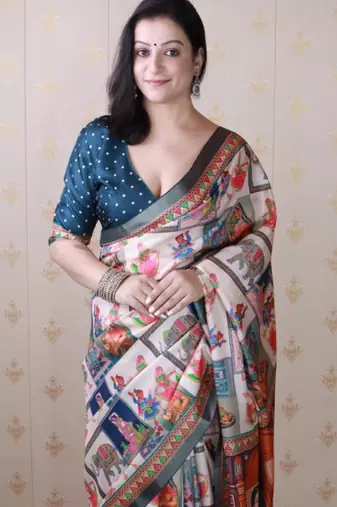 Teal tussar silk digital print zari woven border saree with contrast blouse piece