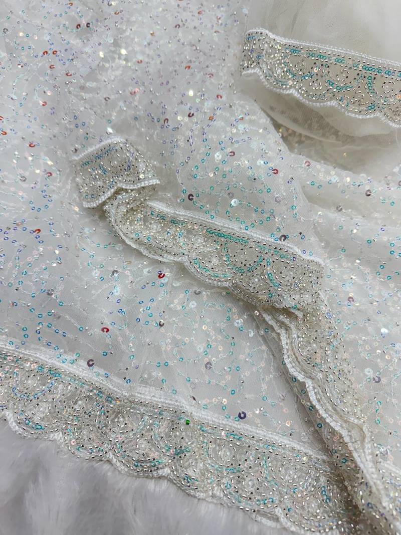 White Color Zari And Sequence Embroidery Work Rangoli Silk Saree