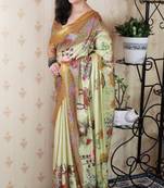Green tussar silk kalamkari print zari woven border saree with contrast blouse piece
