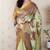 Green tussar silk kalamkari print zari woven border saree with contrast blouse piece