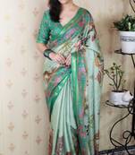 Sea green tussar silk kalamkari print zari woven border saree with contrast blouse piece