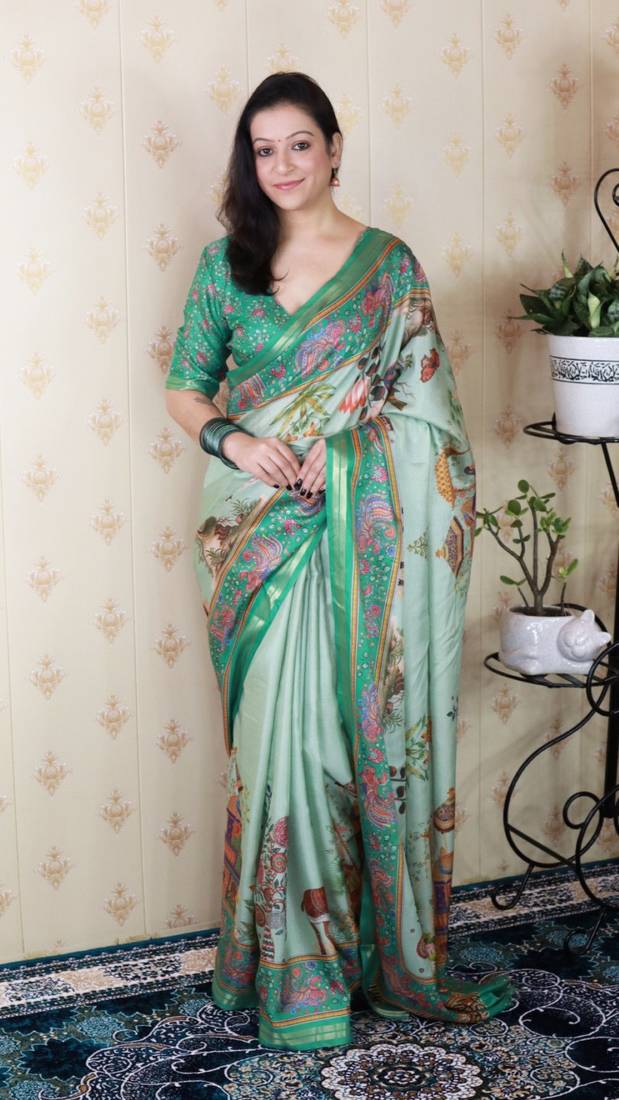 Sea green tussar silk kalamkari print zari woven border saree with contrast blouse piece