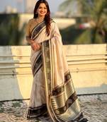Off white soft silk rangoli art zari weaving saree with contrast blouse piece