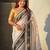Off white soft silk rangoli art zari weaving saree with contrast blouse piece