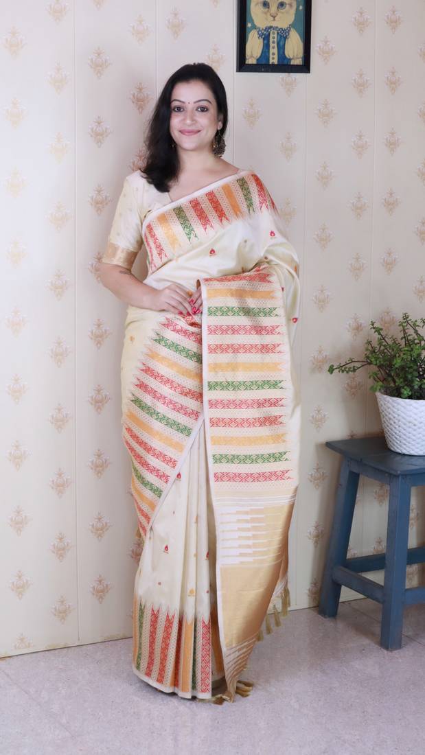 Off white soft silk floral meenakari zari weaving saree with matching blouse piece