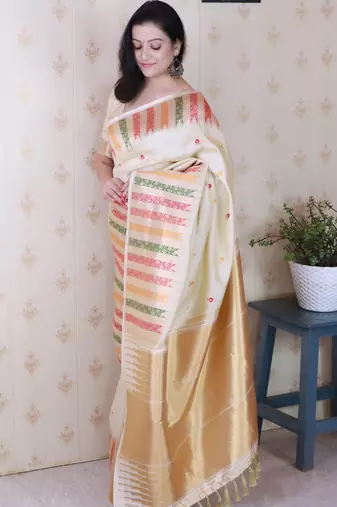 Off white soft silk floral meenakari zari weaving saree with matching blouse piece