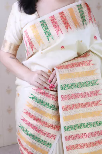 Off white soft silk floral meenakari zari weaving saree with matching blouse piece