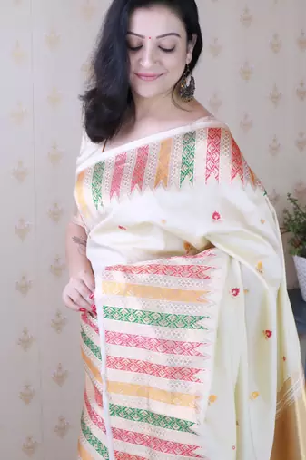 Off white soft silk floral meenakari zari weaving saree with matching blouse piece