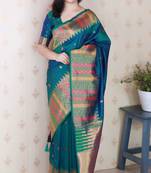 Teal soft silk floral meenakari zari weaving saree with matching blouse piece
