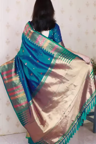 Teal soft silk floral meenakari zari weaving saree with matching blouse piece