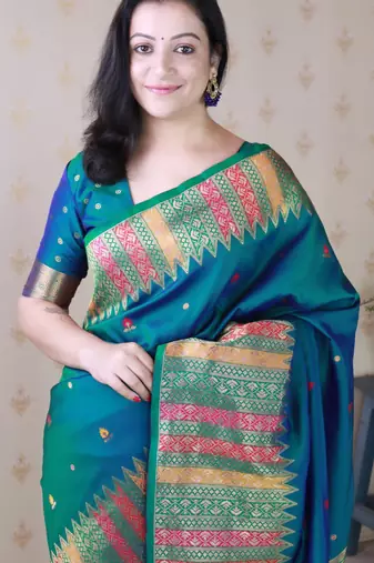 Teal soft silk floral meenakari zari weaving saree with matching blouse piece