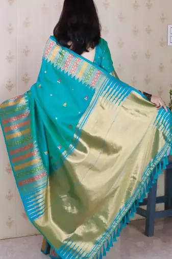 Blue soft silk floral meenakari zari weaving saree with matching blouse piece
