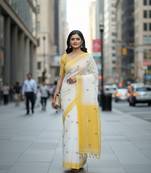 White & yellow fancy cotton handloom saree with blouse piece for women