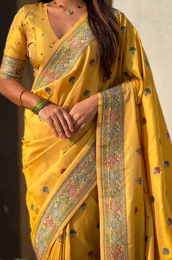 Yellow soft silk baluchari zari meena weaving saree with matching blouse piece