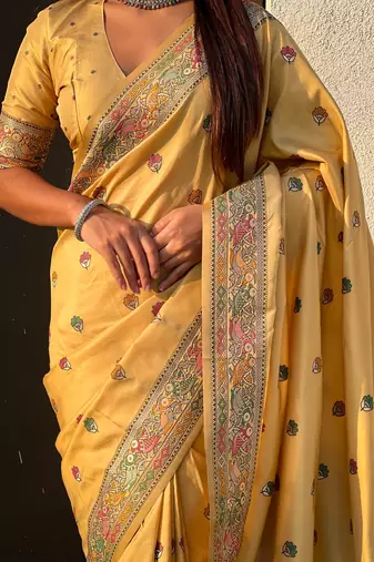 Yellow soft silk baluchari zari meena weaving saree with matching blouse piece
