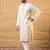 Men off white silk blend solid embroidered straight kurta with trouser